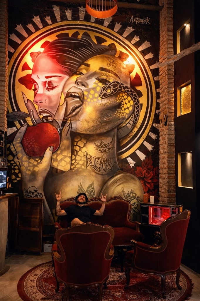 Rebel mural with woman and snake — ArteUnoK